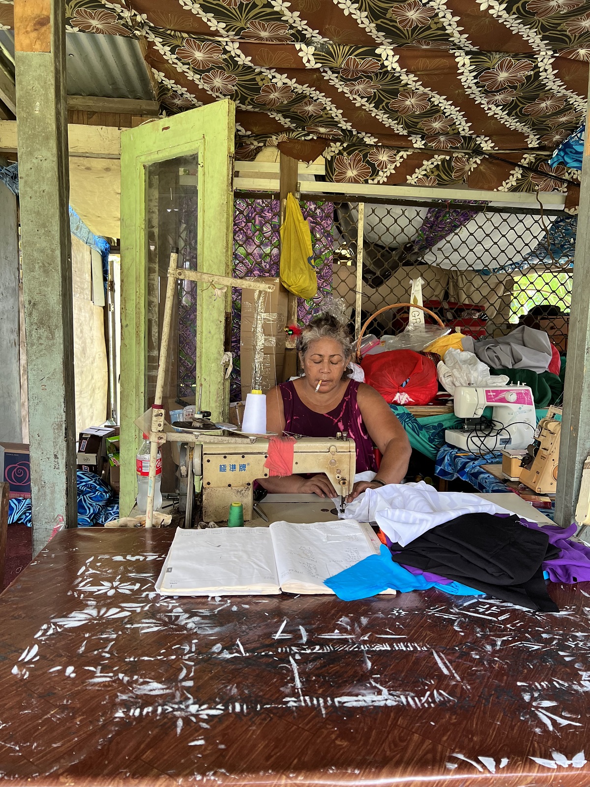 Photo of woman sewing